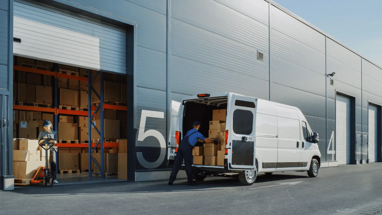 AMCO delivery driver loading packages
